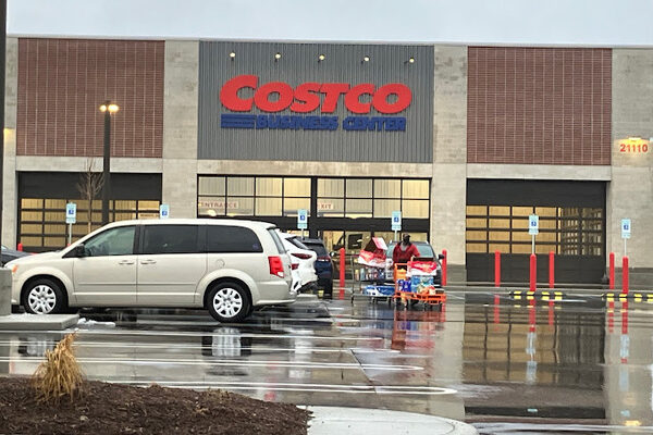 Costco Business Center exterior with parked cars.