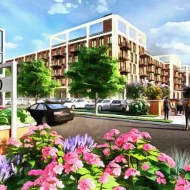 Modern apartment complex with vibrant gardens.